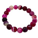 El Coral Fuchsia Agate bracelet with striped strands 10 mm faceted elastic