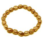 El Coral Bracelet Golden Long Pearls 6x8mm, elastic 